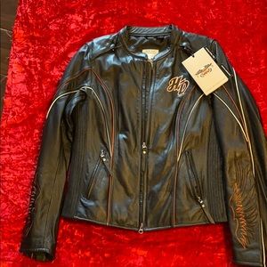 Ladies size Harley Davidson jacket. Matching chaps
